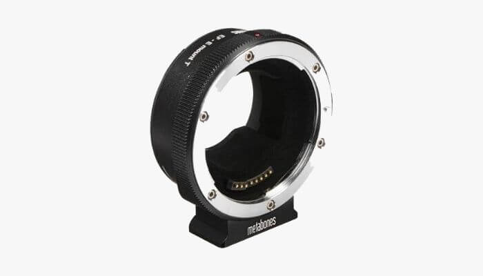 Metabones black lens adapter.