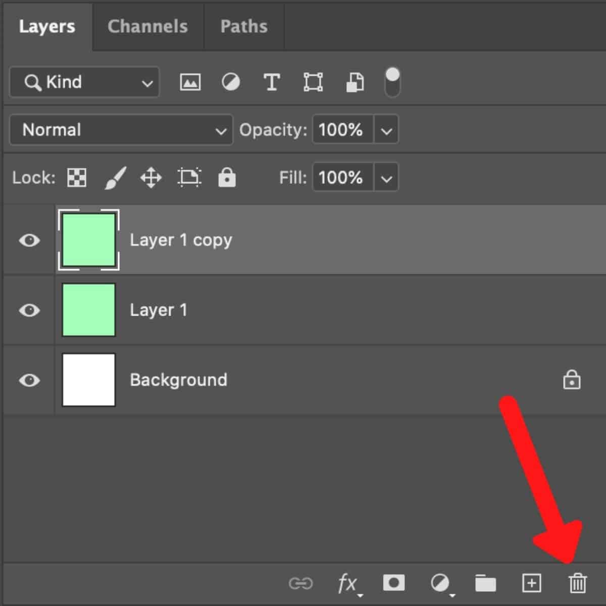 Screenshot of Photoshop with an arrow pointing at the delete button.