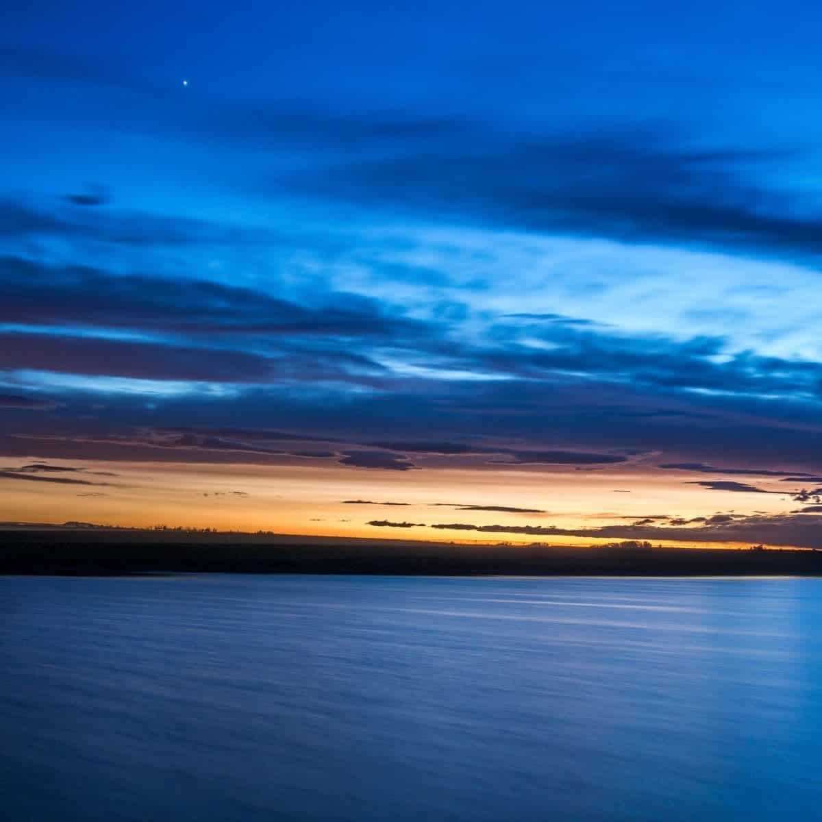 Water and sky during blue hour.