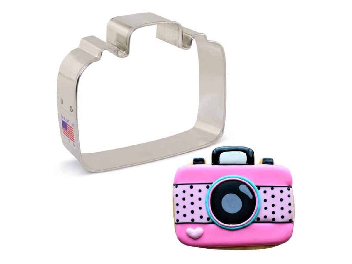 Camera-shaped cookie cutter and cookie.