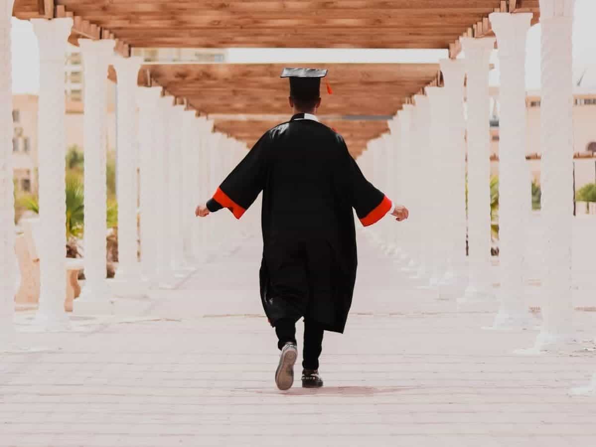 Graduate walking away.