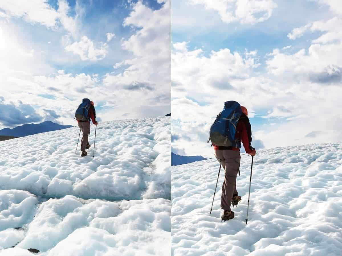 Man hiking a mountain filled with snow.
