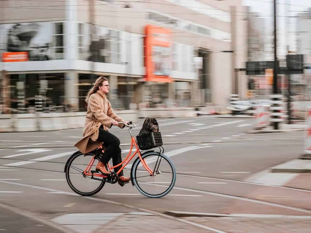 Person riding a bicycle on the street.