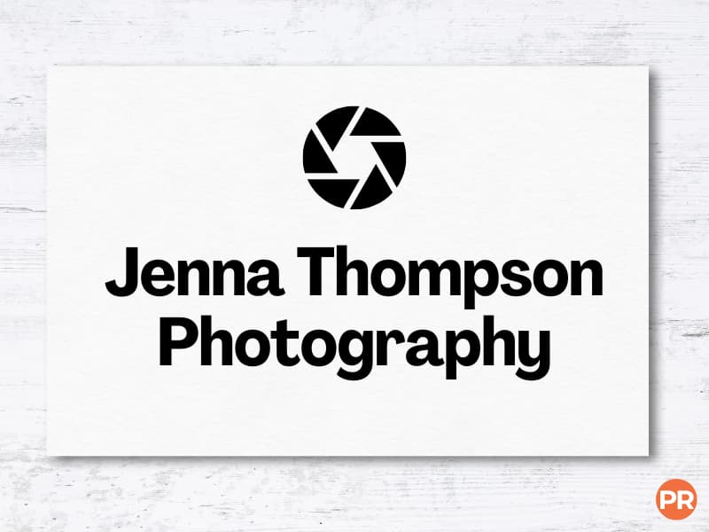 Business card with a lens shutter.