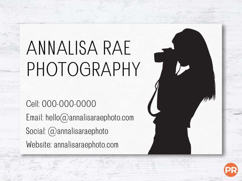 Business card with a silhouette of a photographer.