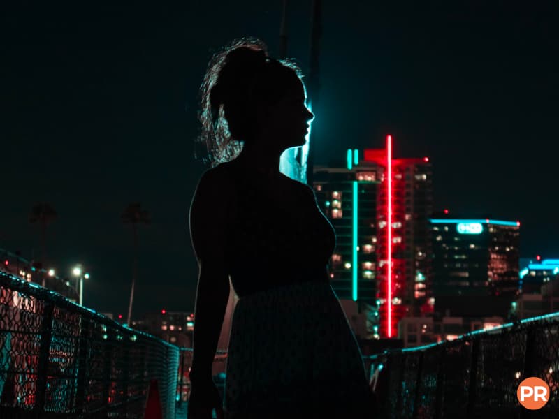 Rim lighting of a person in the city at night.