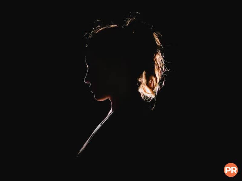 Rim lighting of a woman's side profile.